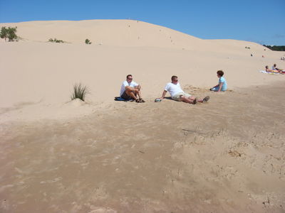 Sitting on the Dunes
Mike, Schmoe, and Kate.  The other kids are far off in the background, climbing a dune.  (Taken Friday, July 20.)
