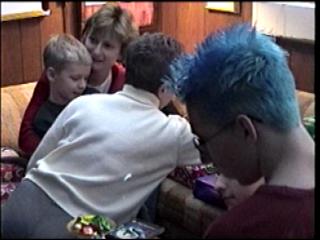 John shows off his blue hair